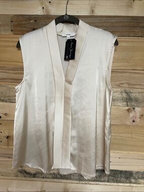 Mine size large ivory color satin v-neck sleeveless blouse